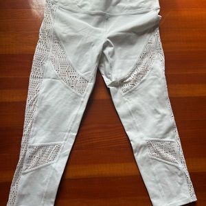 Unique alo legging with cut outs . Size large